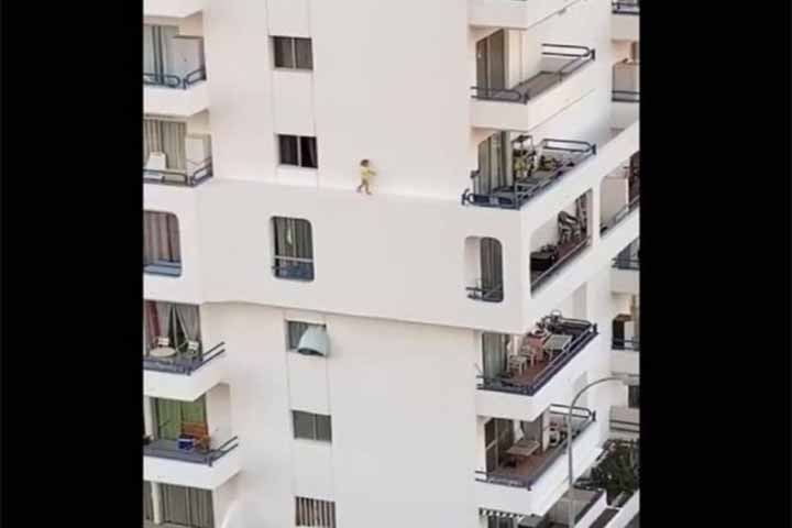 Video of a baby walk in a towering building in Spain goes viral