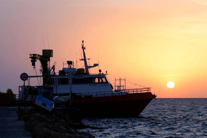 Migrant boat sinks off Tunisia, killing at least 20