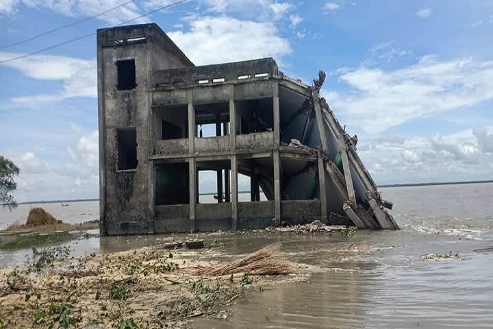 The two-storey building of Char Primary School in Basak has also been submerged in the river