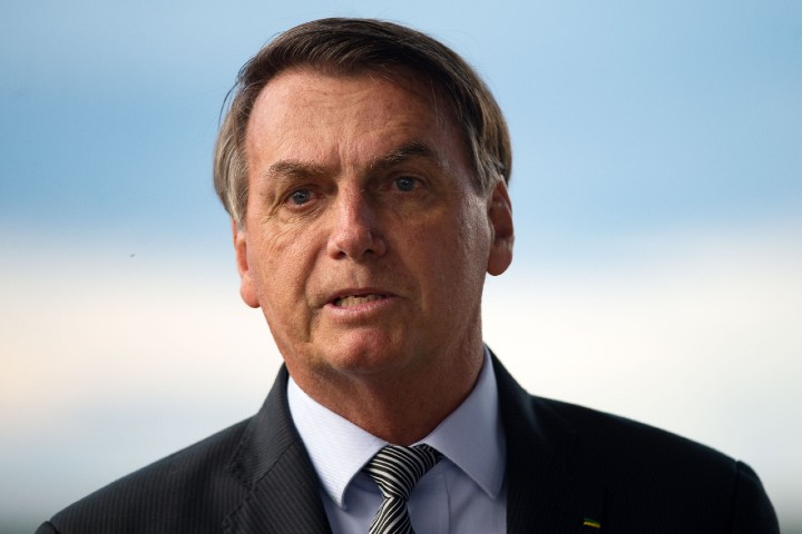 Brazil’s Bolsonaro threatens to punch reporter