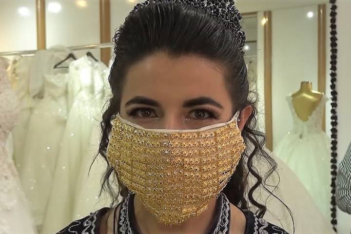 Turkish brides don $10,000 gold masks during COVID-19 pandemic