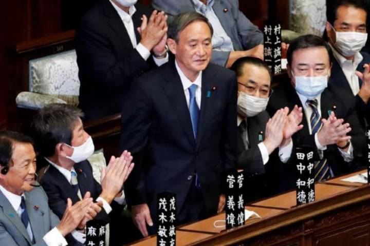 Japan's Suga formally voted in as PM