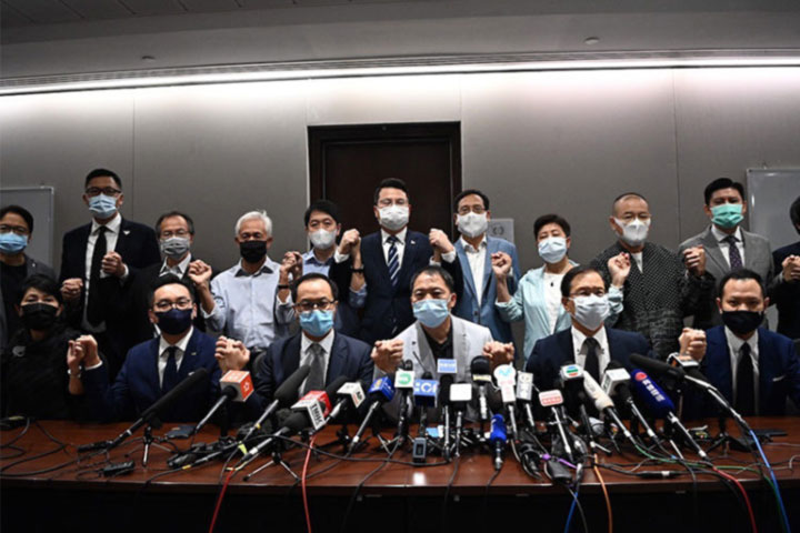 Hong Kong's 15 pro-democracy lawmakers resign