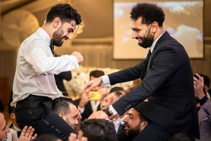 Mo Salah, who has tested positive for coronavirus, dances with his brother Nasr at his wedding in Egypt