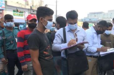 DNCC's operation in Karwan Bazaar: Fines for not wearing a mask