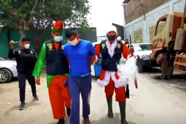 Police conduct drugs raid dressed as Santa Claus and elf