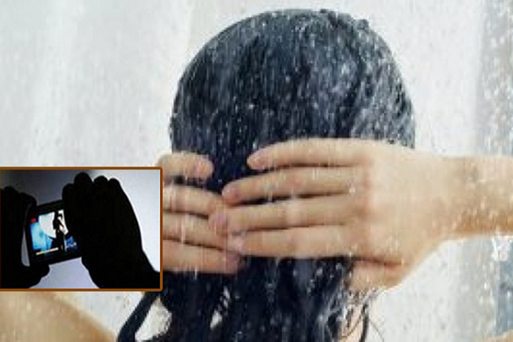 Rape containing video of cousin's wife taking a bath