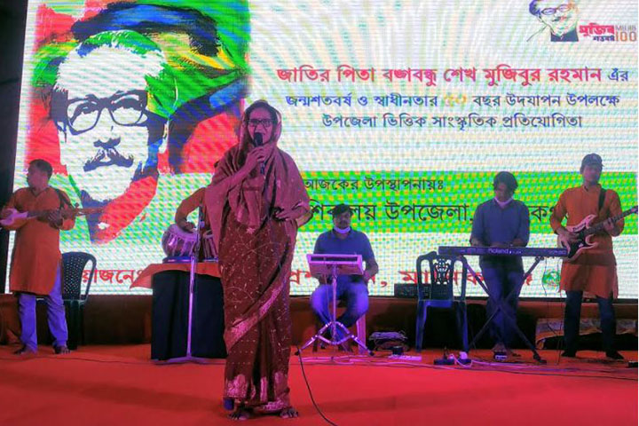 Sarala Begum, a 71-year-old UP member, is also on the stage