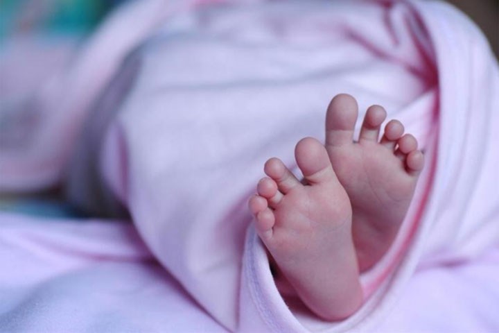 Mother is probed for attempted murder after shutting emaciated 'unwanted' baby in wardrobe