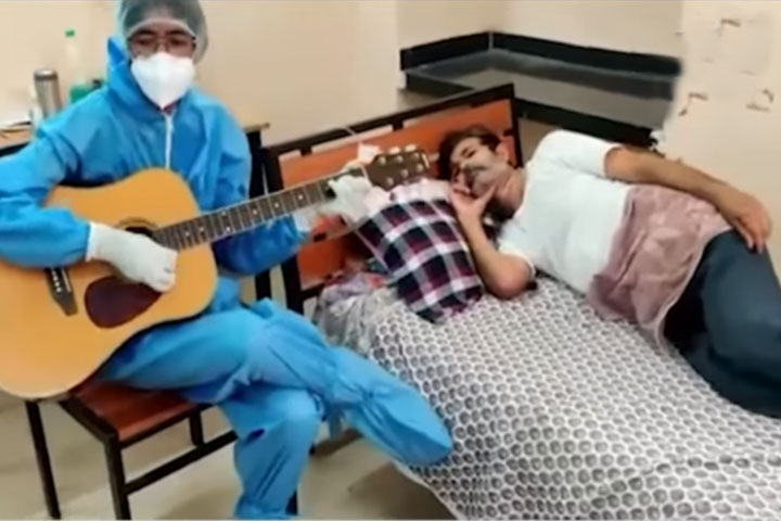 corona infected father admitted in covid centre son plays guiter infront of him