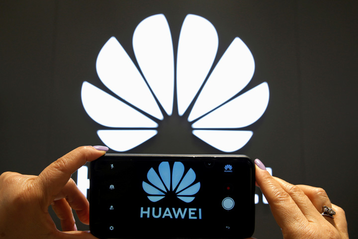 Biden expands US investment ban on Chinese firms including Huawei